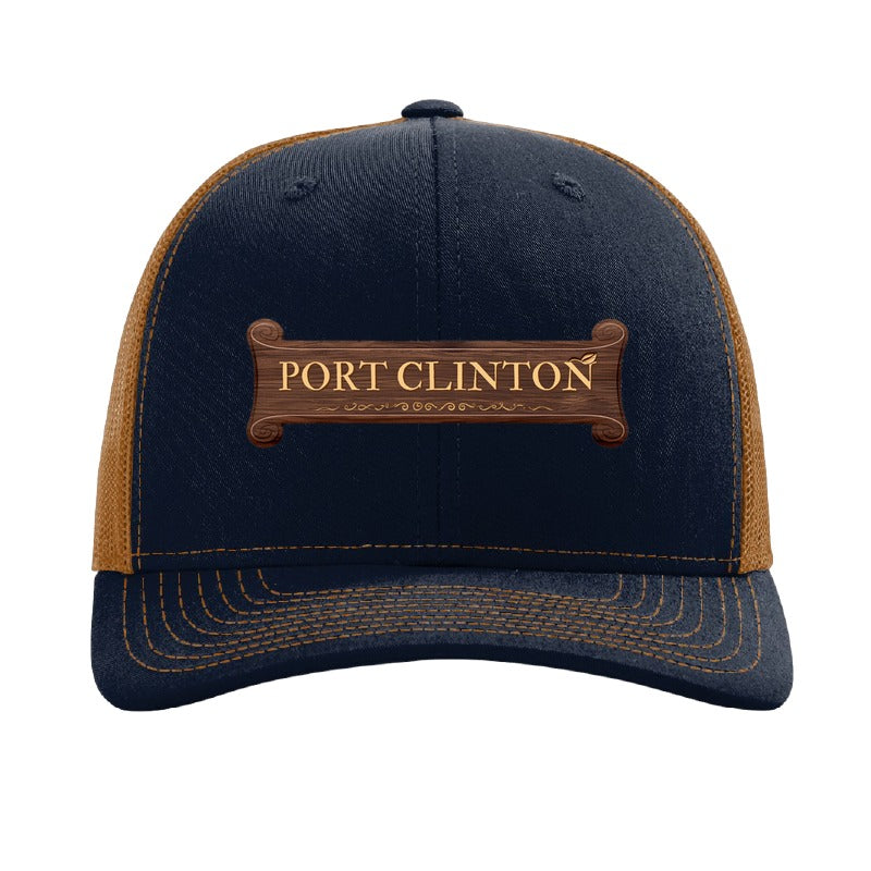 Port Clinton carved banner patch on a Richardson 112 trucker hat, Navy/Caramel