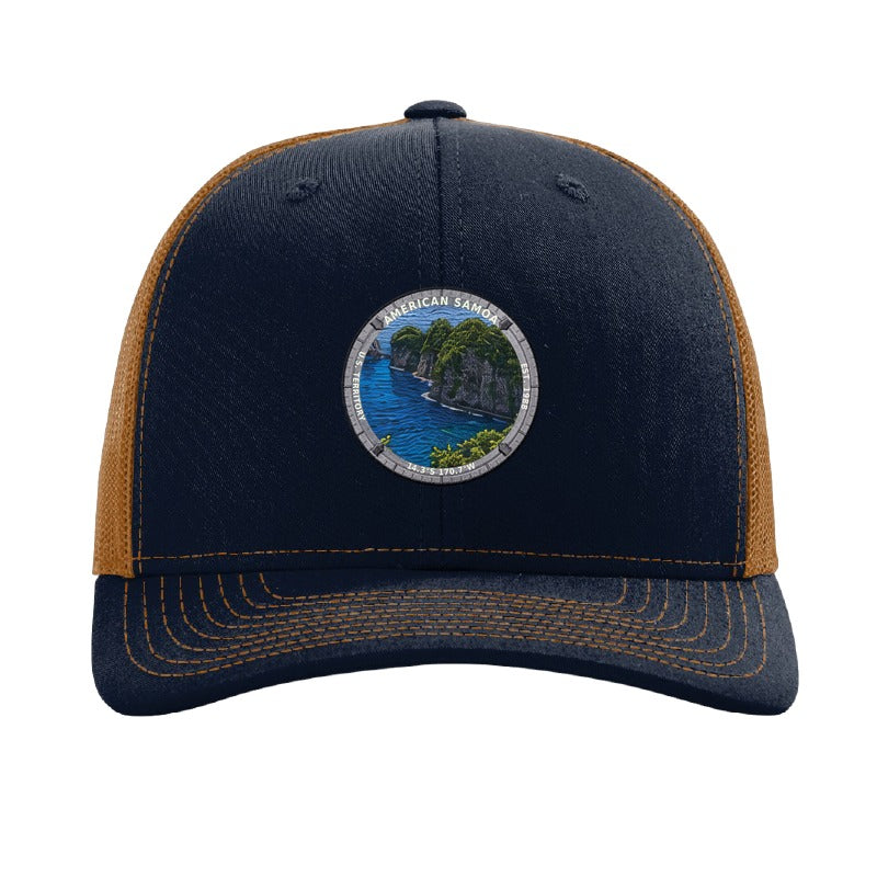 American Samoa National Park patch hat in Navy/Caramel — jungle sea cliffs badge on a Richardson 112 trucker cap