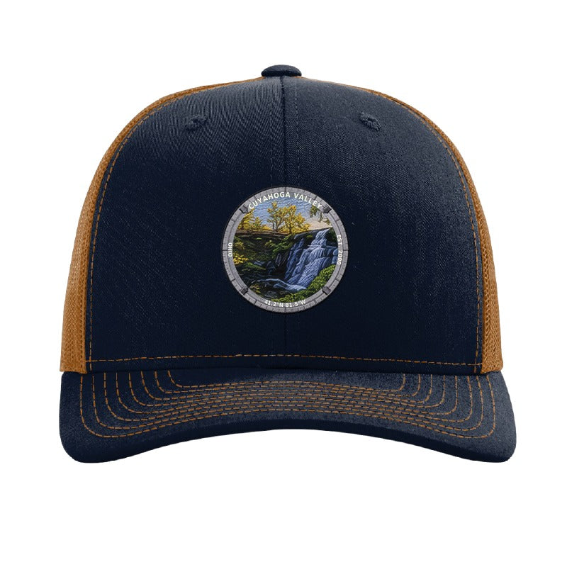Cuyahoga Valley National Park patch hat in Navy/Caramel — Brandywine Falls badge on a Richardson 112 trucker cap