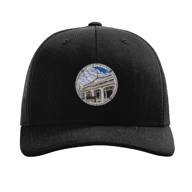 Hot Springs National Park patch hat in Black — Bathhouse Row badge on a Richardson 112 trucker cap