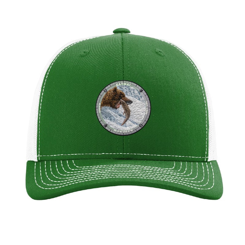 Katmai National Park patch hat in Kelly Green/White — brown bear catching salmon at Brooks Falls badge on a Richardson 112 trucker cap