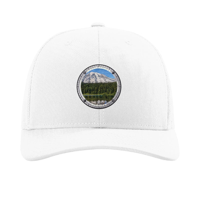 Mount Rainier National Park patch hat in White — Rainier reflected in a lake badge on a Richardson 112 trucker cap