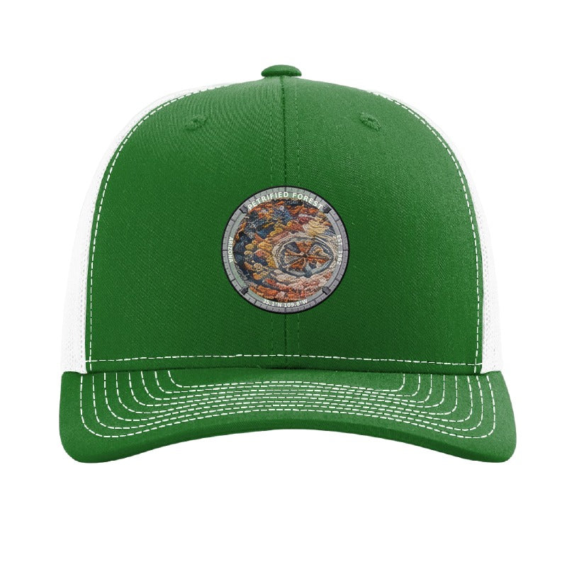Petrified Forest National Park patch hat in Kelly Green/White — petrified log cross-section badge on a Richardson 112 trucker cap