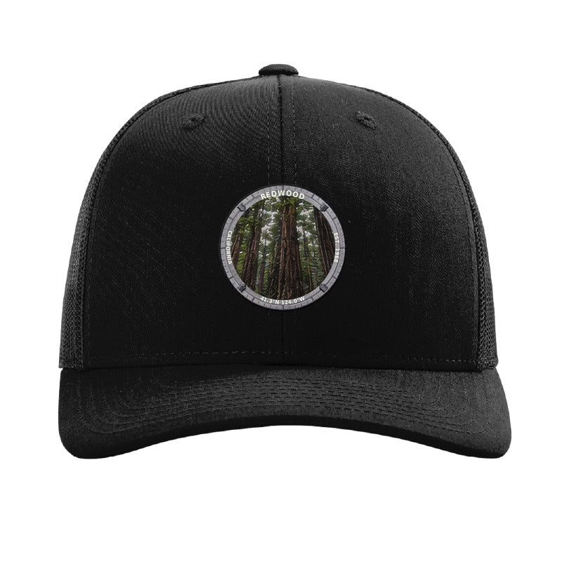 Redwood National Park patch hat in Black — coast redwood grove badge on a Richardson 112 trucker cap