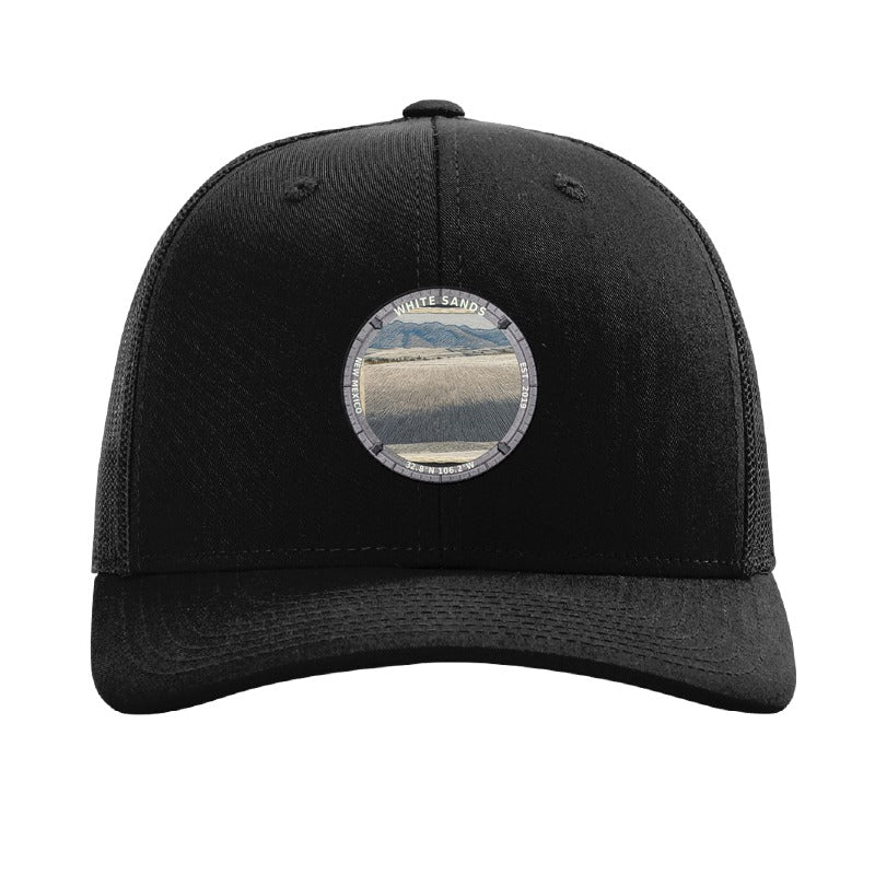 White Sands National Park patch hat in Black — white gypsum dunes badge on a Richardson 112 trucker cap