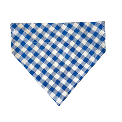 Blue and white checkered fabric on a marble surface