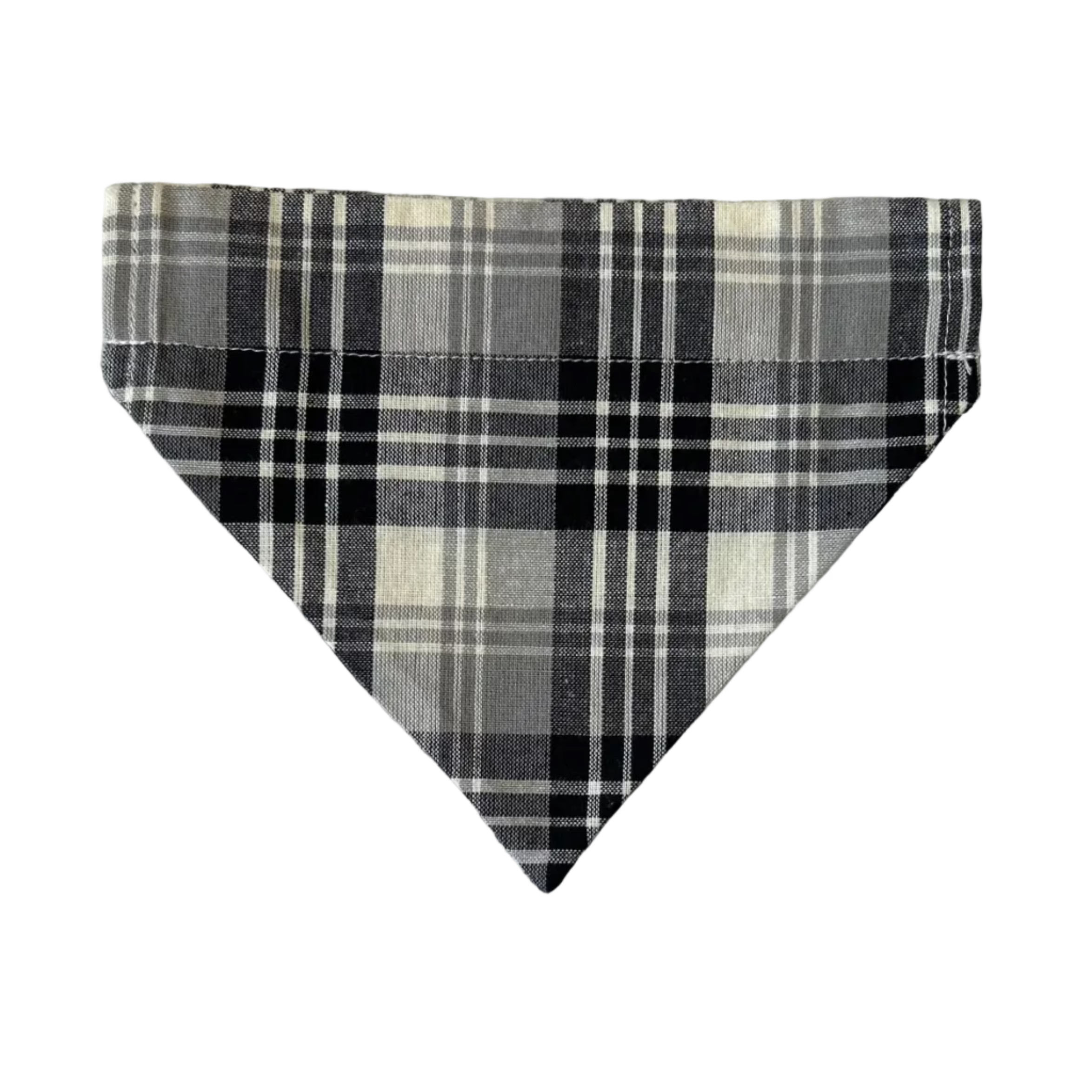 Plaid triangle-shaped object on a marble surface