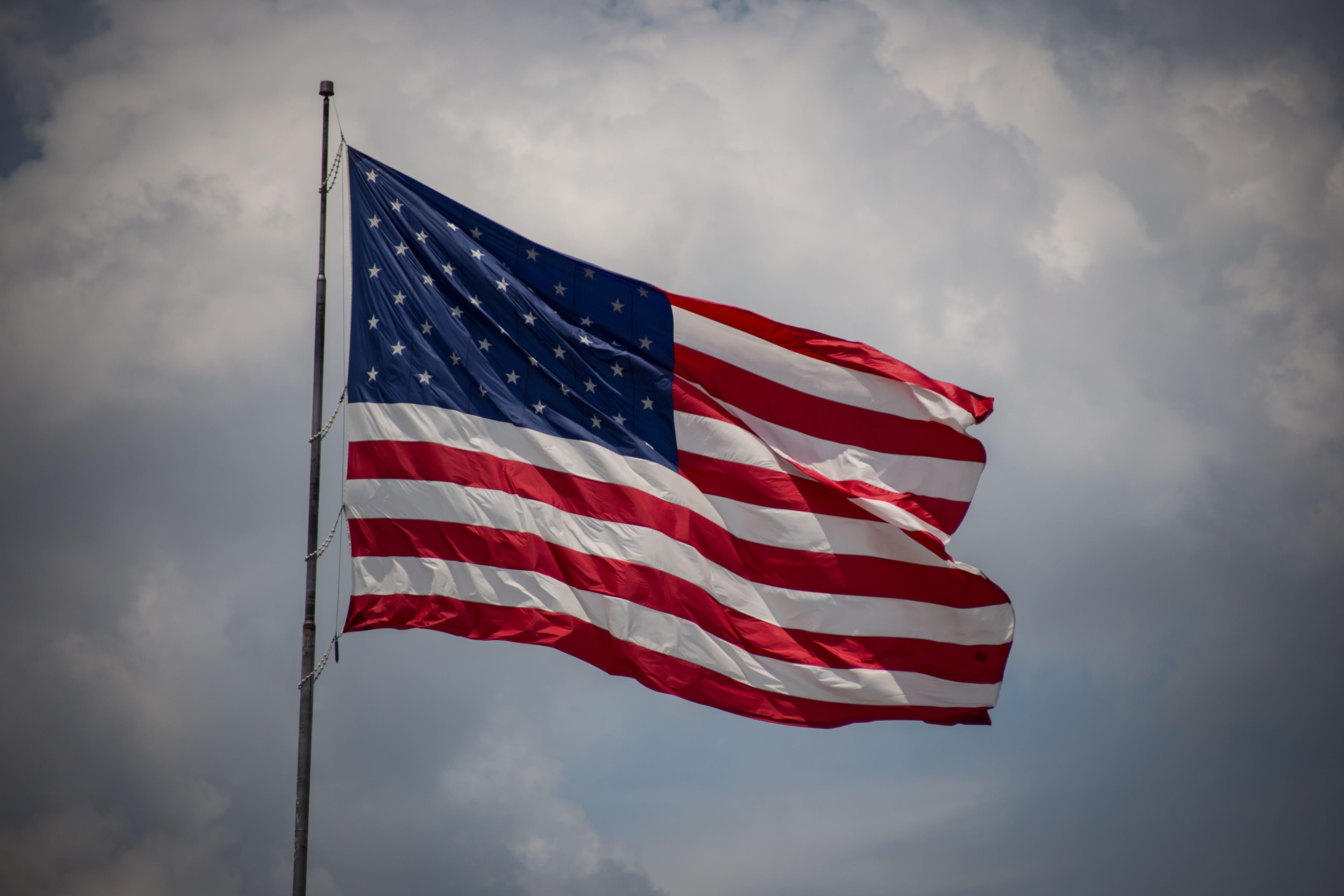 american flag flying in the wind