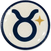 Taurus hat button side patch: a Taurus zodiac glyph on a white domed button. Zodiac collection.