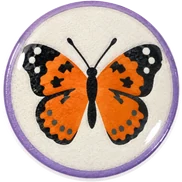 Painted lady hat button side patch: a painted lady butterfly on a white domed button. Butterflies collection.