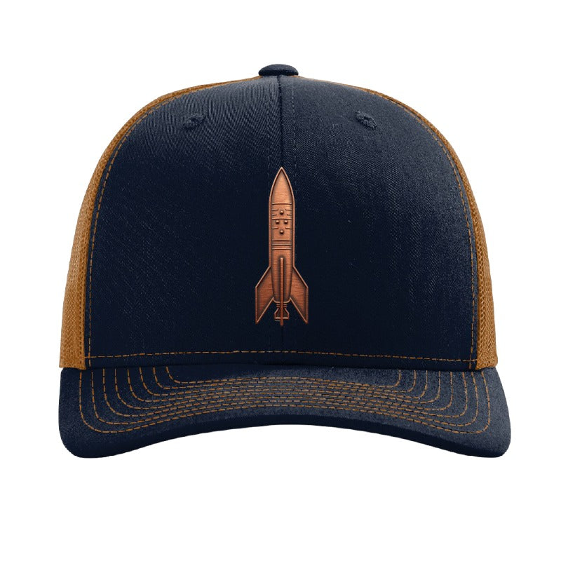 Copper rocket patch trucker hat, Andøya Norway first orbit — Navy/Caramel