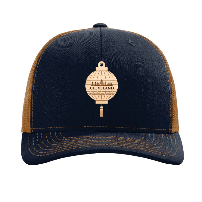 Cleveland Paper Lantern patch on a Richardson 112 trucker hat, Navy/Caramel