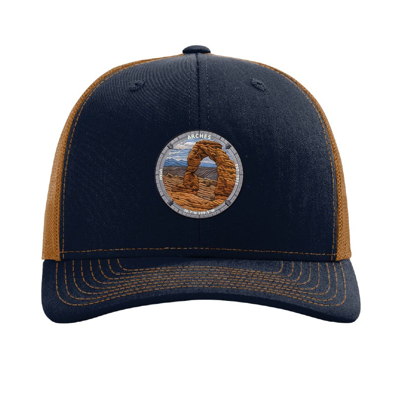 Arches National Park patch hat in Navy/Caramel — Delicate Arch badge on a Richardson 112 trucker cap