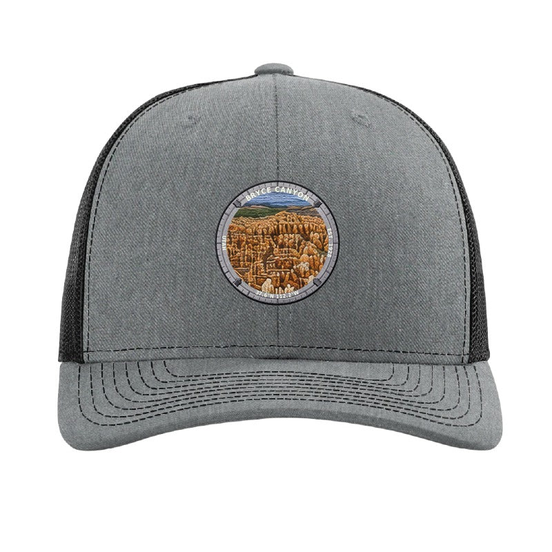 Bryce Canyon National Park patch hat in Heather Grey/Black — hoodoo amphitheatre badge on a Richardson 112 trucker cap