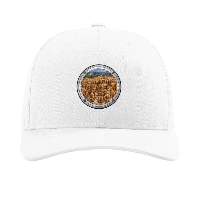 Bryce Canyon National Park patch hat in White — hoodoo amphitheatre badge on a Richardson 112 trucker cap