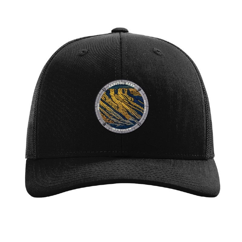 Capitol Reef National Park patch hat in Black — folded sandstone strata badge on a Richardson 112 trucker cap