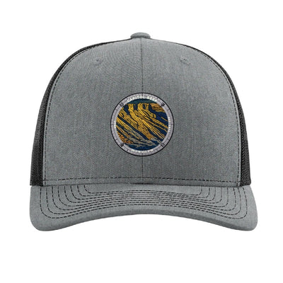 Capitol Reef National Park patch hat in Heather Grey/Black — folded sandstone strata badge on a Richardson 112 trucker cap
