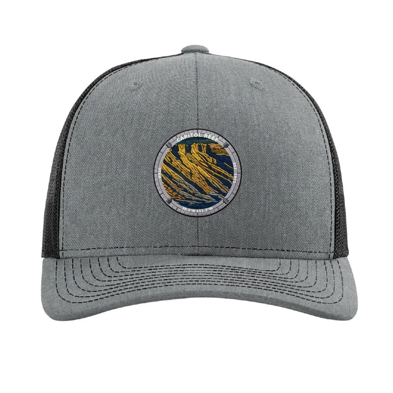 Capitol Reef National Park patch hat in Heather Grey/Black — folded sandstone strata badge on a Richardson 112 trucker cap