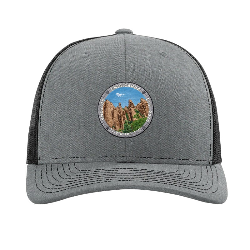 Chiricahua National Park patch hat in Heather Grey/Black — standing rock columns badge on a Richardson 112 trucker cap