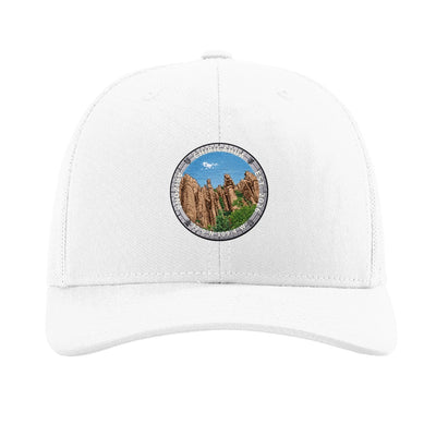Chiricahua National Park patch hat in White — standing rock columns badge on a Richardson 112 trucker cap