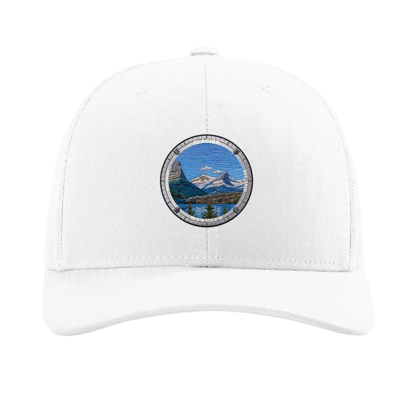 Glacier National Park patch hat in White — Wild Goose Island badge on a Richardson 112 trucker cap