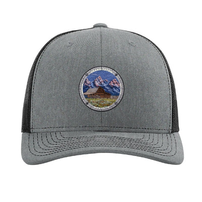 Grand Teton National Park patch hat in Heather Grey/Black — Moulton Barn and the Tetons badge on a Richardson 112 trucker cap
