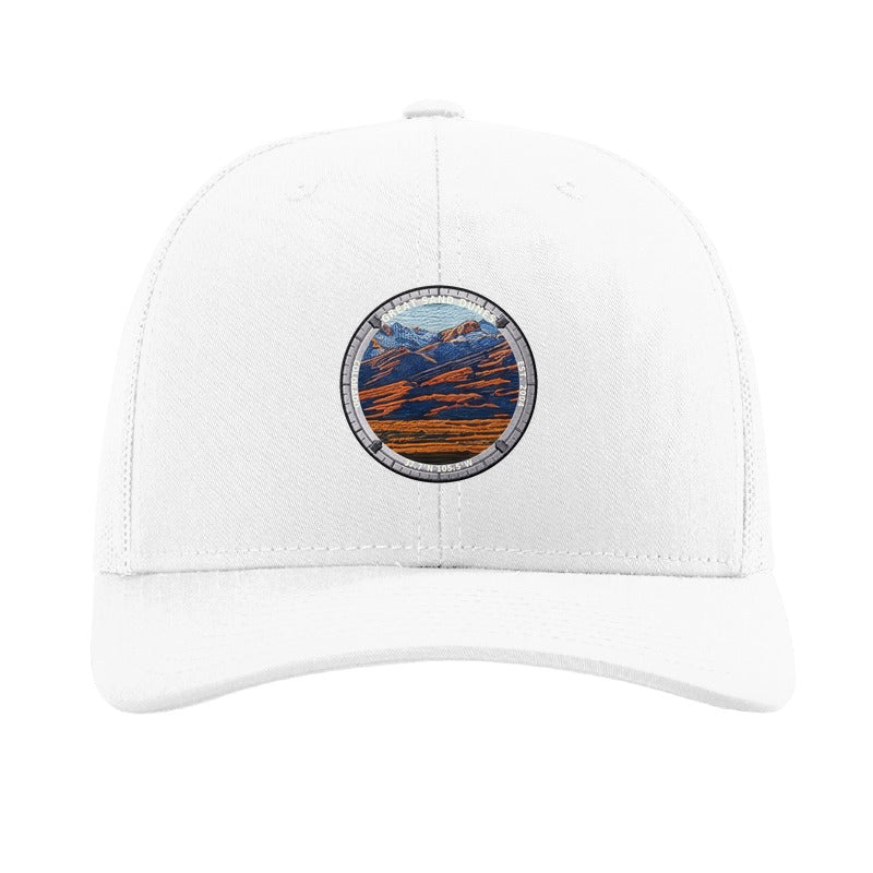 Great Sand Dunes National Park patch hat in White — dunes below the Sangre de Cristos badge on a Richardson 112 trucker cap