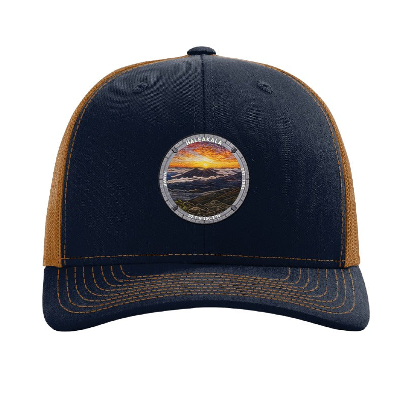 Haleakalā National Park patch hat in Navy/Caramel — volcanic crater sunrise badge on a Richardson 112 trucker cap