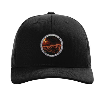 Hawaii Volcanoes National Park patch hat in Black — lava flowing over black rock badge on a Richardson 112 trucker cap