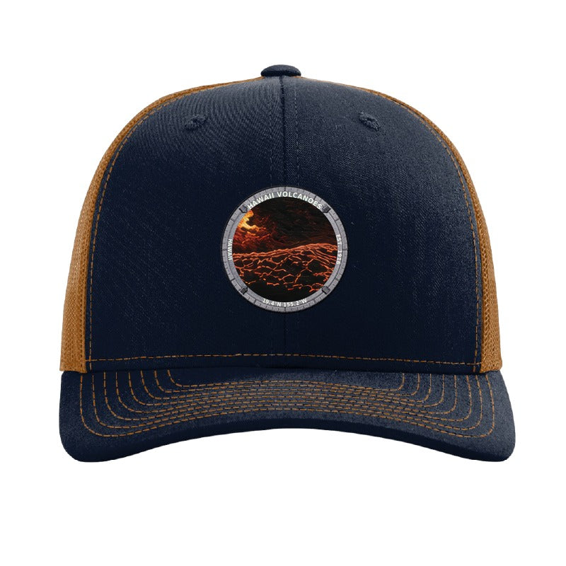 Hawaii Volcanoes National Park patch hat in Navy/Caramel — lava flowing over black rock badge on a Richardson 112 trucker cap