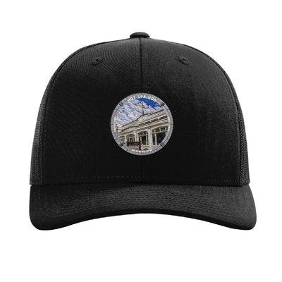Hot Springs National Park patch hat in Black — Bathhouse Row badge on a Richardson 112 trucker cap