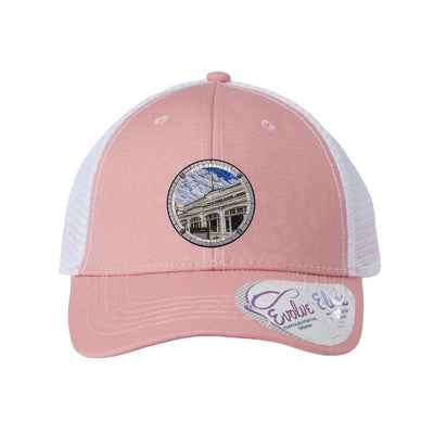 Hot Springs National Park patch hat in Dusty Rose/White — Bathhouse Row badge on an Infinity Charlie ponytail cap