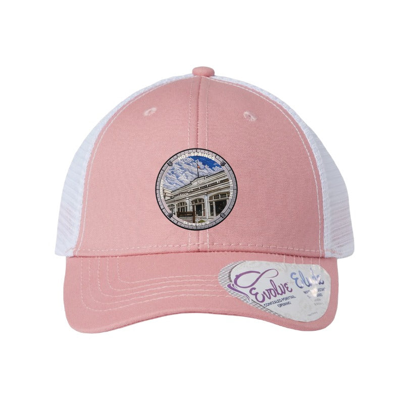 Hot Springs National Park patch hat in Dusty Rose/White — Bathhouse Row badge on an Infinity Charlie ponytail cap