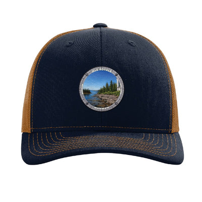 Isle Royale National Park patch hat in Navy/Caramel — Rock Harbor Lighthouse badge on a Richardson 112 trucker cap