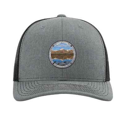 Lake Clark National Park patch hat in Heather Grey/Black — turquoise lake below snow-capped peaks badge on a Richardson 112 trucker cap