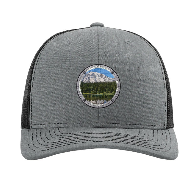 Mount Rainier National Park patch hat in Heather Grey/Black — Rainier reflected in a lake badge on a Richardson 112 trucker cap