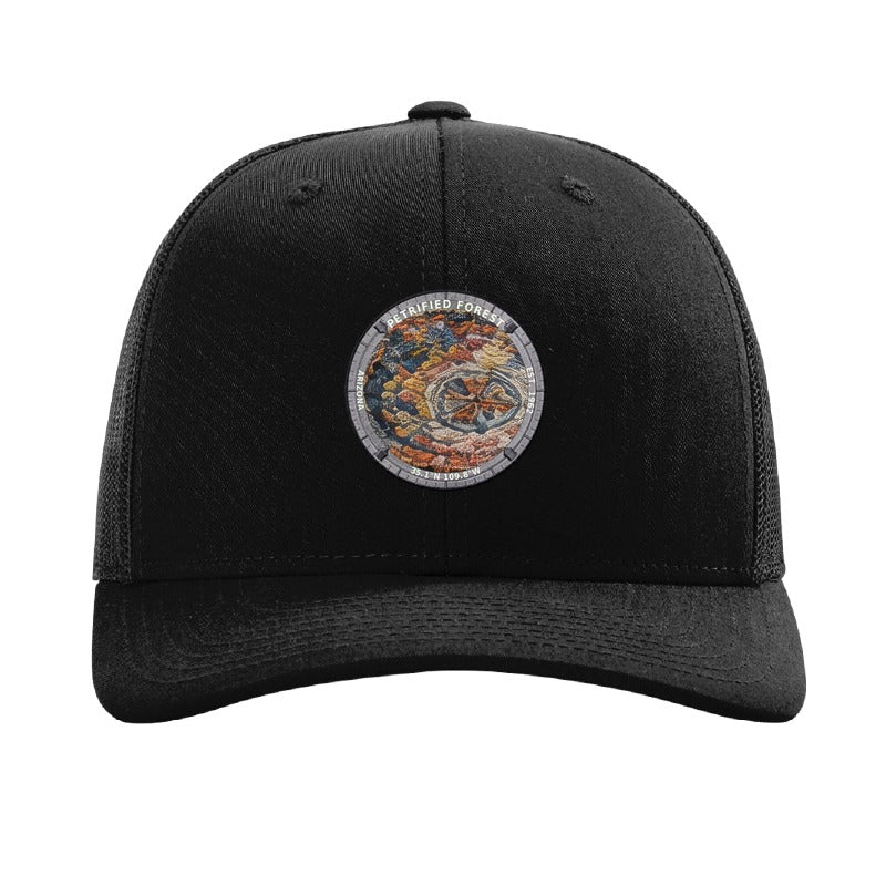 Petrified Forest National Park patch hat in Black — petrified log cross-section badge on a Richardson 112 trucker cap