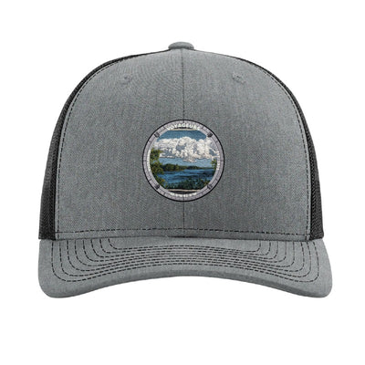 Voyageurs National Park patch hat in Heather Grey/Black — lake and pine shoreline badge on a Richardson 112 trucker cap