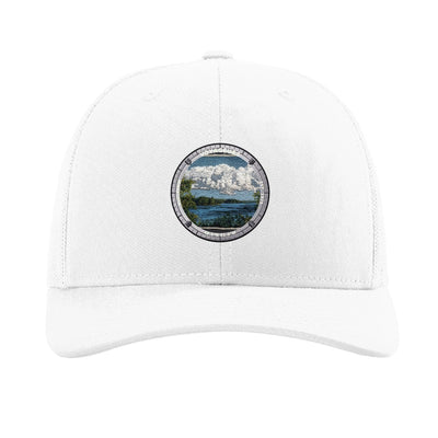 Voyageurs National Park patch hat in White — lake and pine shoreline badge on a Richardson 112 trucker cap