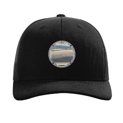 White Sands National Park patch hat in Black — white gypsum dunes badge on a Richardson 112 trucker cap