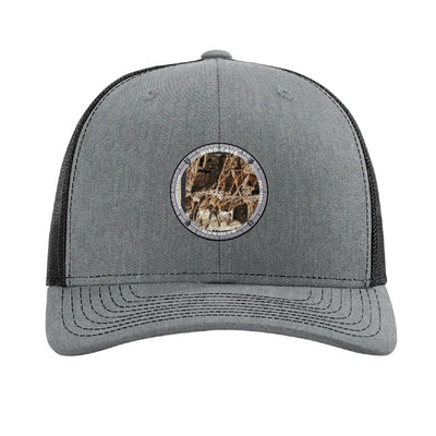 Wind Cave National Park patch hat in Heather Grey/Black — boxwork calcite formation badge on a Richardson 112 trucker cap