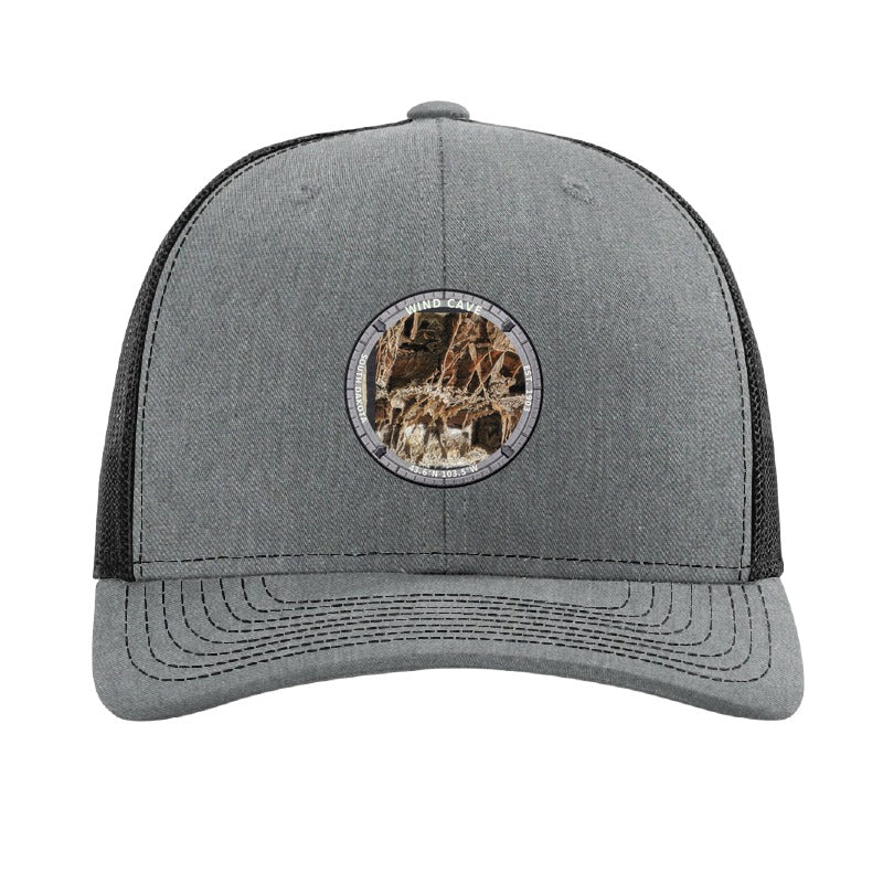 Wind Cave National Park patch hat in Heather Grey/Black — boxwork calcite formation badge on a Richardson 112 trucker cap