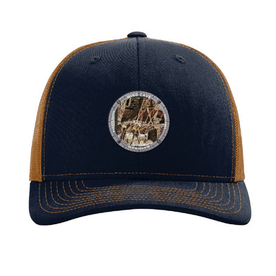 Wind Cave National Park patch hat in Navy/Caramel — boxwork calcite formation badge on a Richardson 112 trucker cap