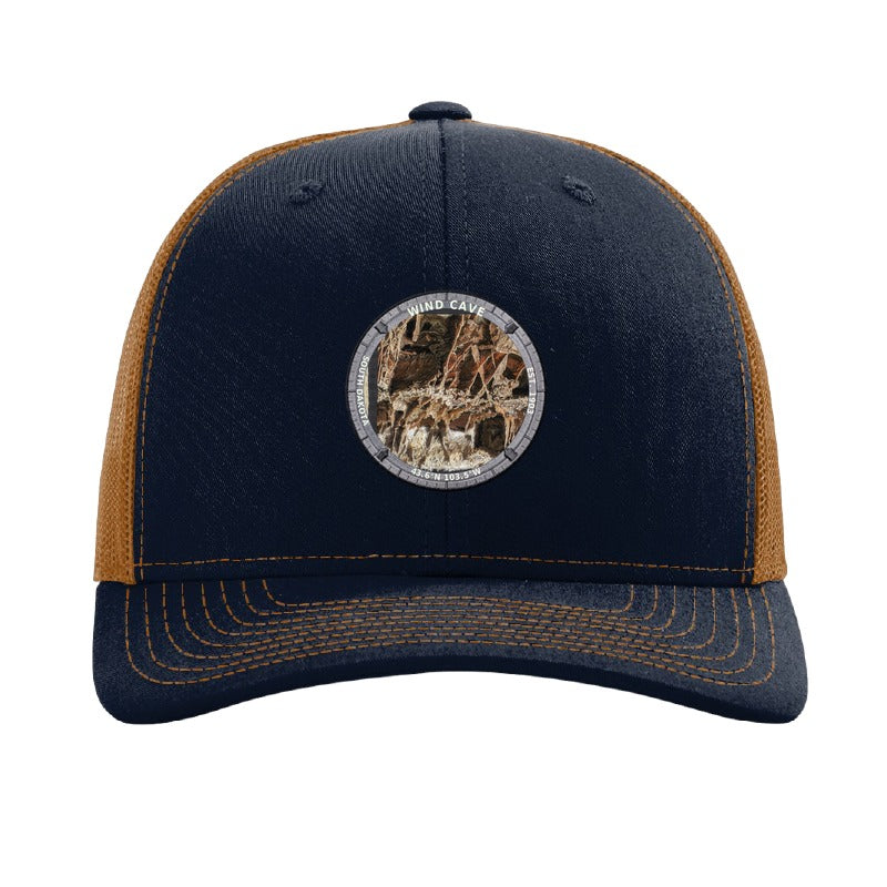 Wind Cave National Park patch hat in Navy/Caramel — boxwork calcite formation badge on a Richardson 112 trucker cap