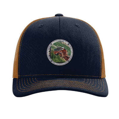 Wrangell-St. Elias National Park patch hat in Navy/Caramel — Kennecott Mines badge on a Richardson 112 trucker cap