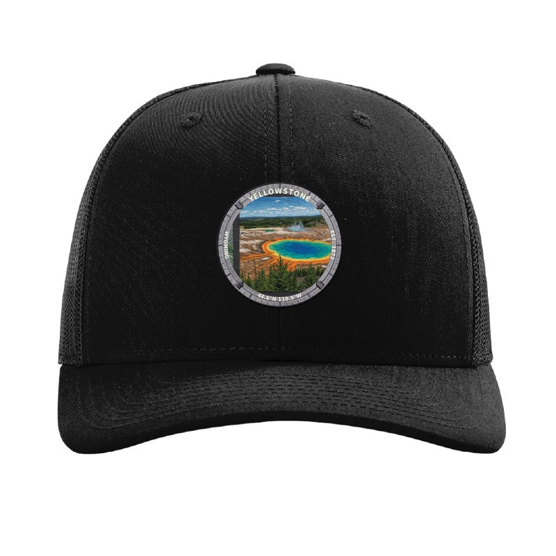 Yellowstone National Park patch hat in Black — Grand Prismatic Spring badge on a Richardson 112 trucker cap