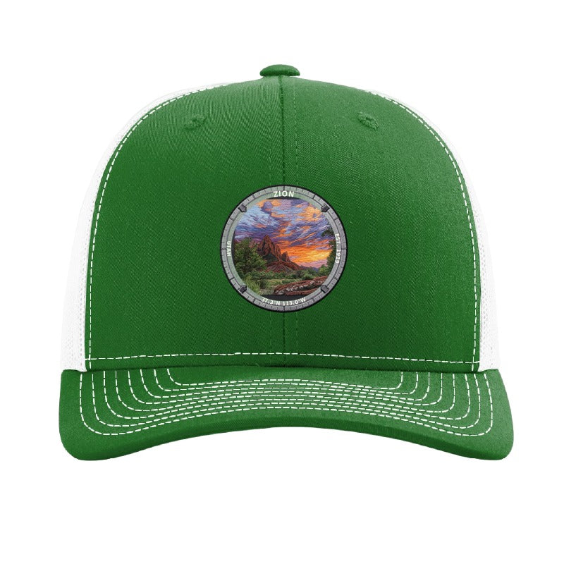 Zion National Park patch hat in Kelly Green/White — red sandstone cliffs at sunset badge on a Richardson 112 trucker cap