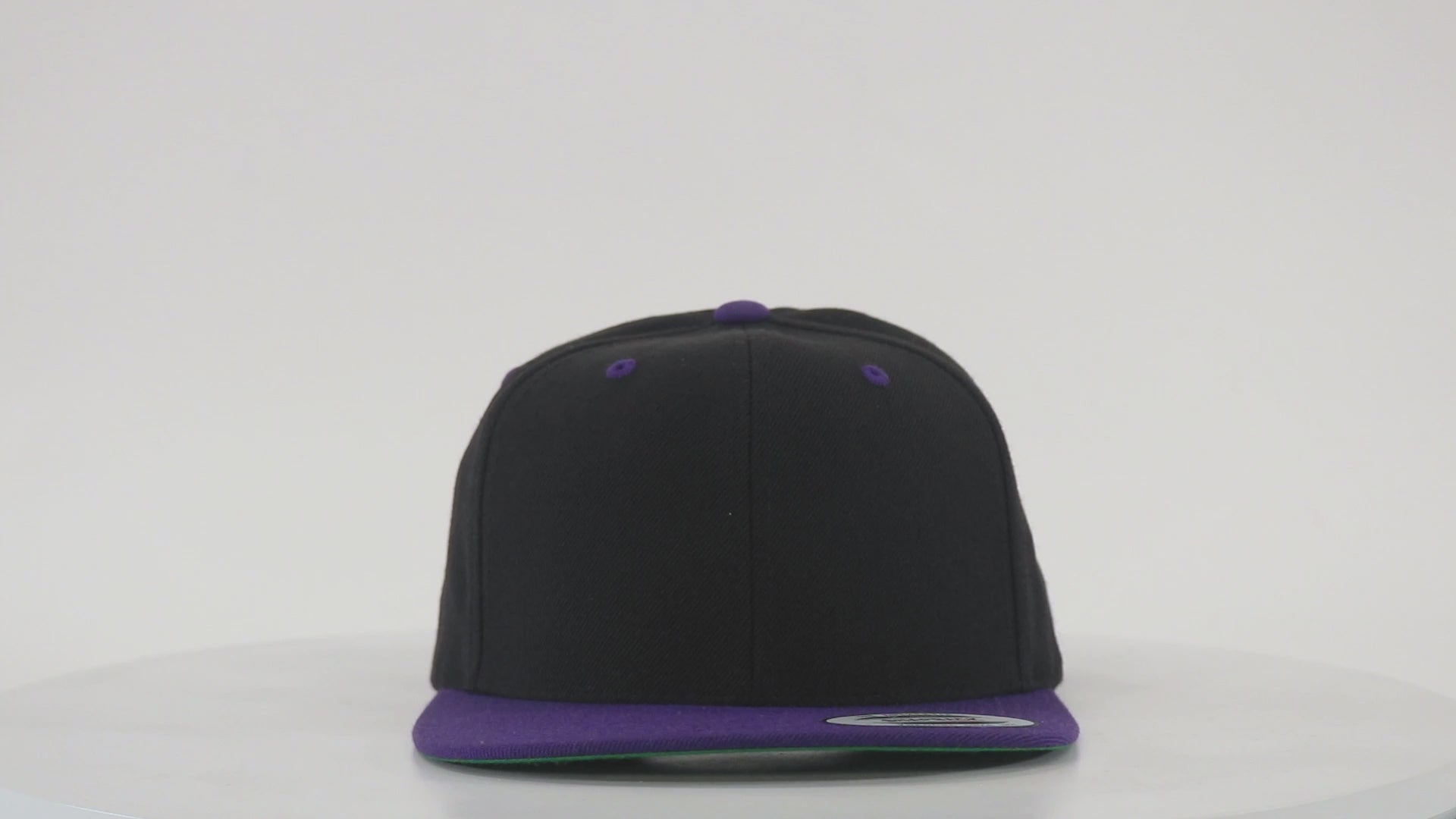 Load video: Yupoong 6089M Premium Flatbill Snapback Hat with Patch