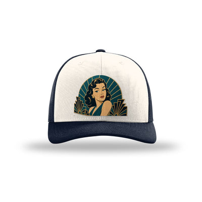 The Starlet art deco pin-up hat on a Richardson 112 trucker in Cream/Navy
